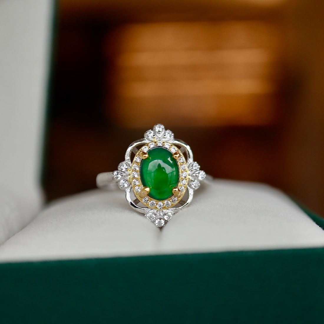 S925 Sterling Silver Natural Jadeite Ring: This ring features natural jadeite as its main stone, showcasing a rich gold and cool white hue that highlights the jadeite's exquisite luster and texture. It is crafted with S925 sterling silver usin