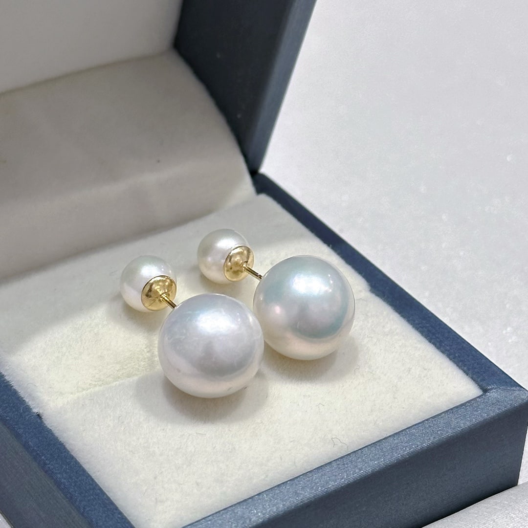 Sterling Silver Natural Pearl Earrings: These earrings are crafted from sterling silver, showcasing a perfect blend of rich gold and cool white. The large pearls, approximately 11-12mm in diameter, possess a flawless finish that allows each