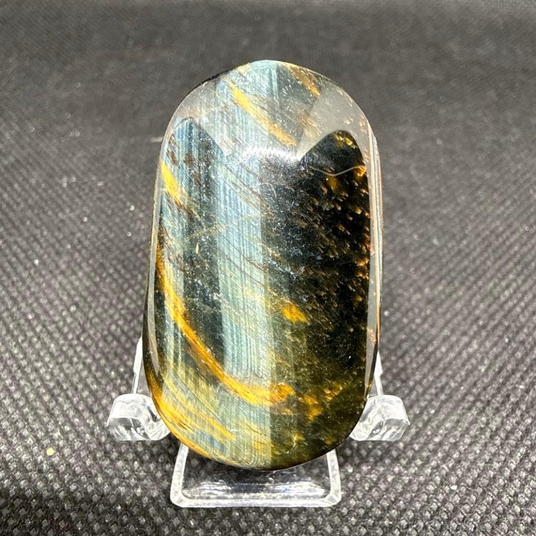 High-quality natural tiger's eye polished palm blue stone. (1 of 14)
