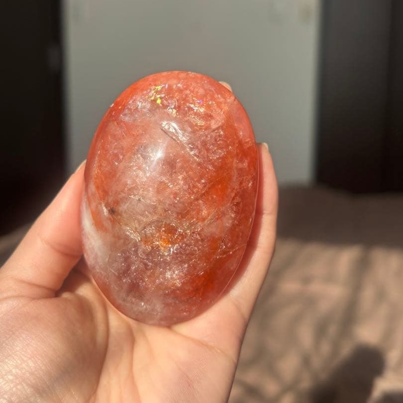 Rainbow Fire Quartz: Rainbow Fire Quartz (Quartz with Hematite) Handheld Stone, Palm-Shaped, Total Length Approximately 74mm Rainbow Fire Quartz, containing Hematite, handcrafted stone, composite stone, total length appro