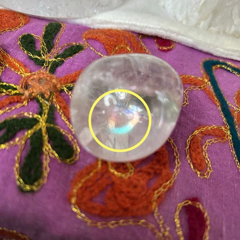 Crystal polished stone with iridescent inclusions (1 of 3)
