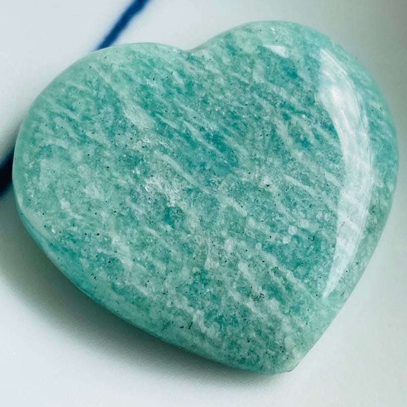 Natural Amazonite Heart-Shaped Polished Stone: Natural Amazonite Heart-Shaped Polished Stone Approximately 21 grams The Syrah grapes blend perfectly into both sides of the wine. It sparkles. Photos taken by the window using natural light. Color