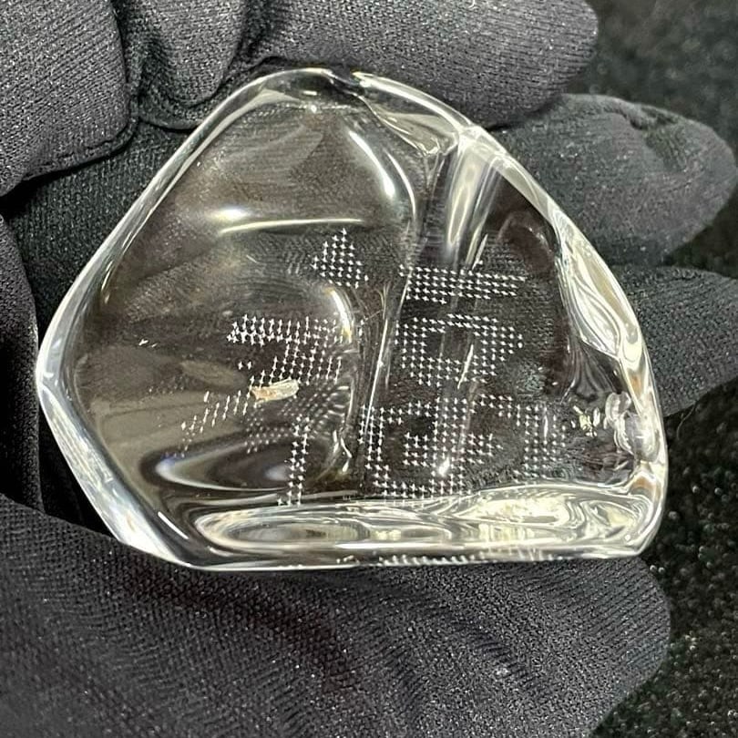 Crystal: Crystal Rolling Fortune Laser Engraving Crystal laser engraving is a technique that uses laser technology to engrave text and patterns inside the crystal. This crystal ornament, engraved with the