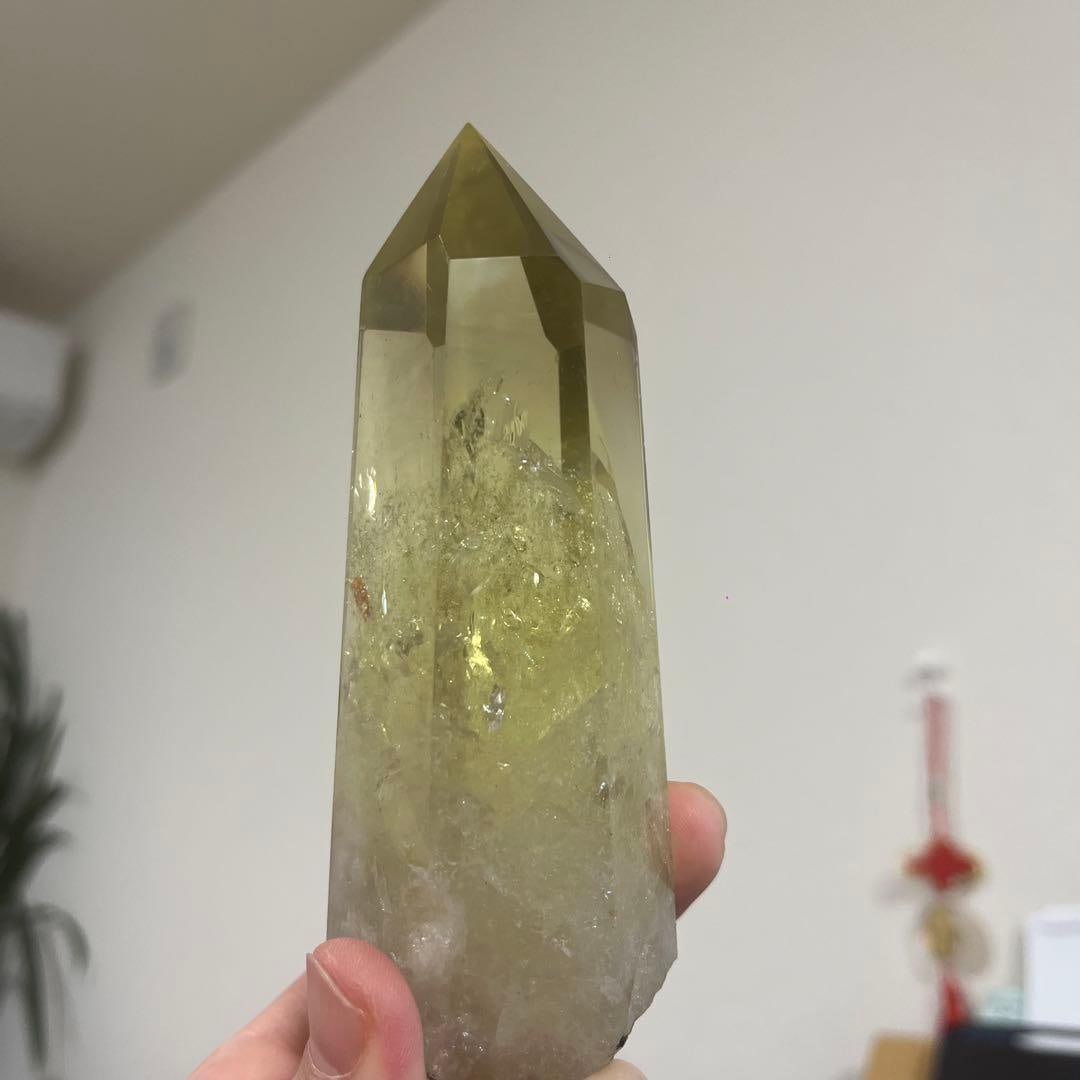 Yellow crystal column, hexagonal prism shape. - 13