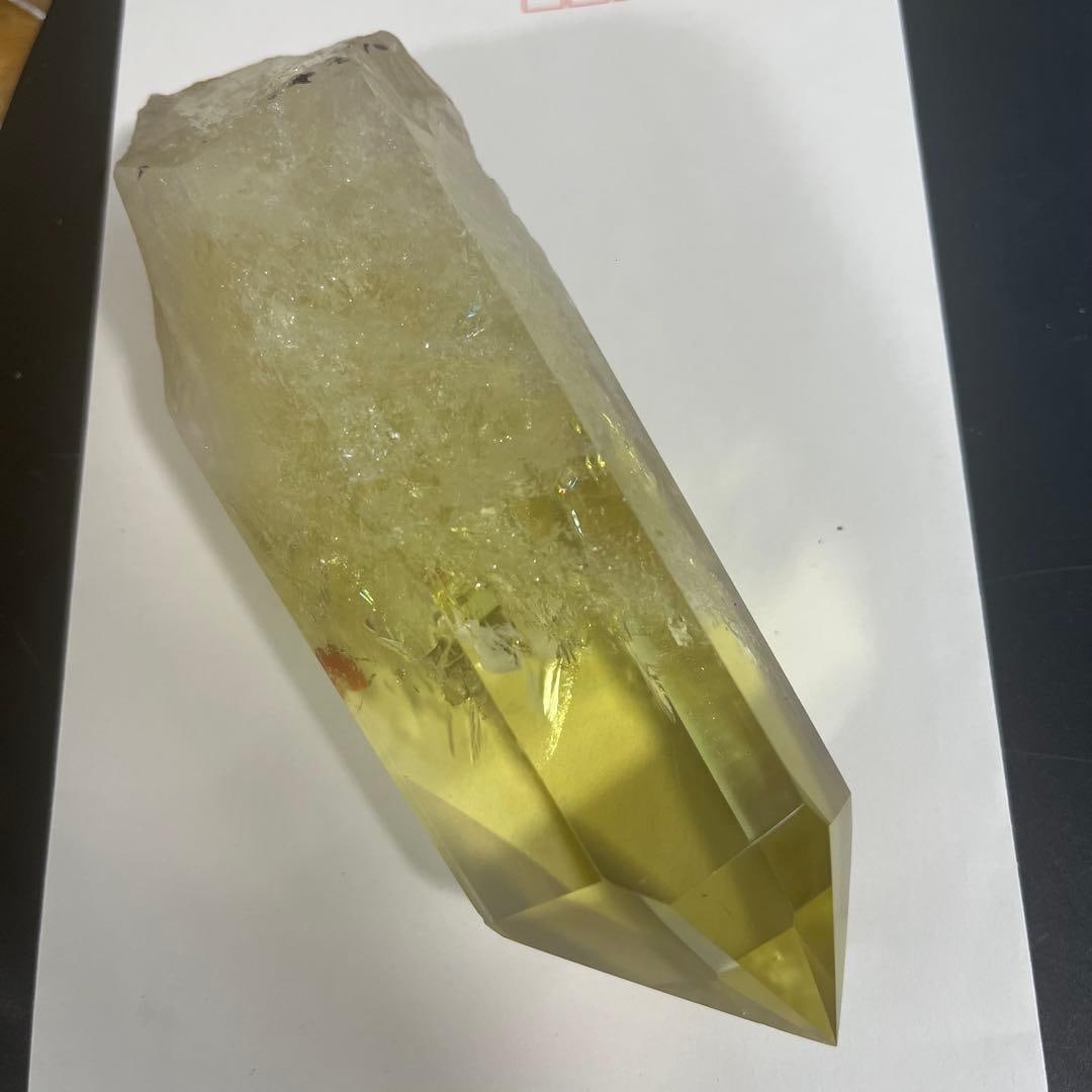 Yellow crystal column, hexagonal prism shape. - 16