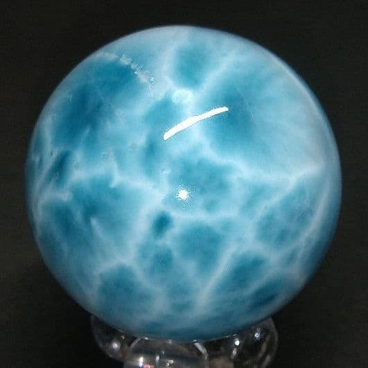 Superb Larimar Bead with Azure Sea Pattern: Azure Sea Pattern Super Larimar Sphere, 27.2 mm, 30.41 grams The striking contrast between the white and blue colors fully demonstrates its quality. This sphere is large, thus making a significant