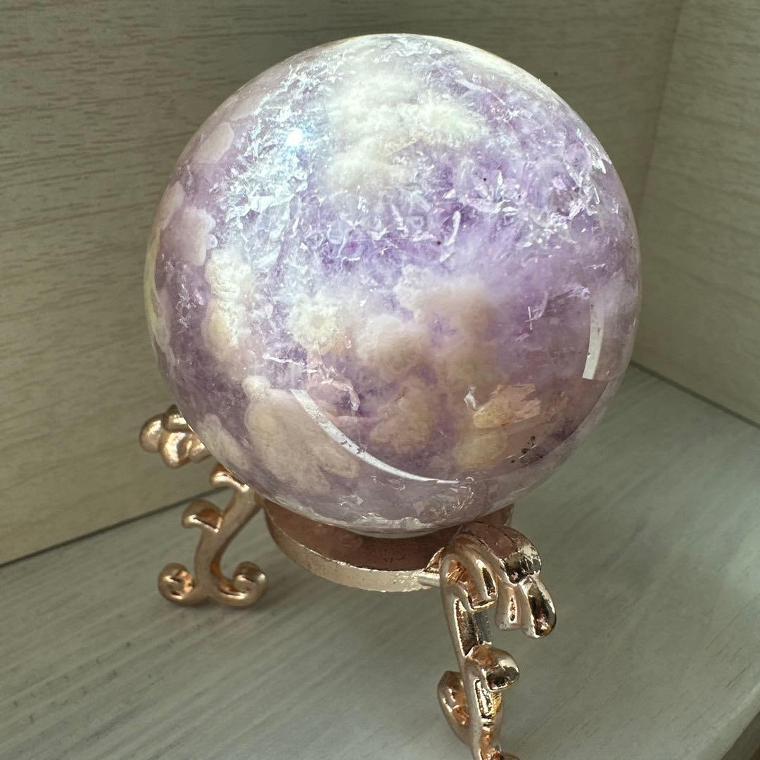Beautiful Purple-Pink Amethyst: Beautiful Purple-Pink Amethyst/Pink Amethyst Sphere A beautiful pink amethyst sphere with deep purple hues. The floral patterns are exquisite, and it is a lovely sphere featuring some thick, transluce