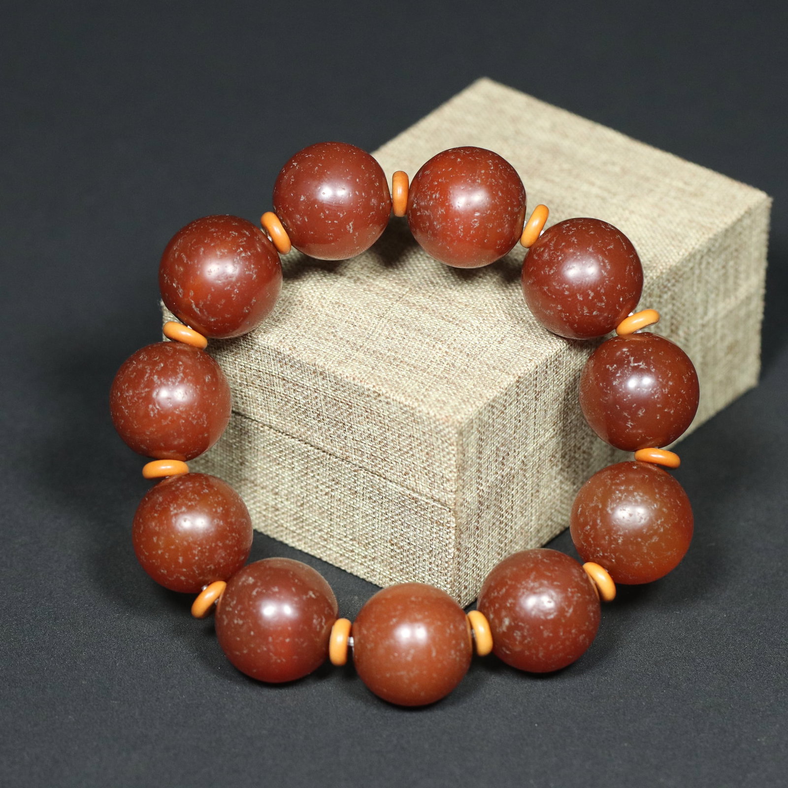 Qing Dynasty Agate Bracelet: A fine collection of Qing Dynasty old agate bracelet, composed of 11 round beads, featuring exquisite craftsmanship and delicate jade quality with a well-developed patina. Each bead has a diameter of 