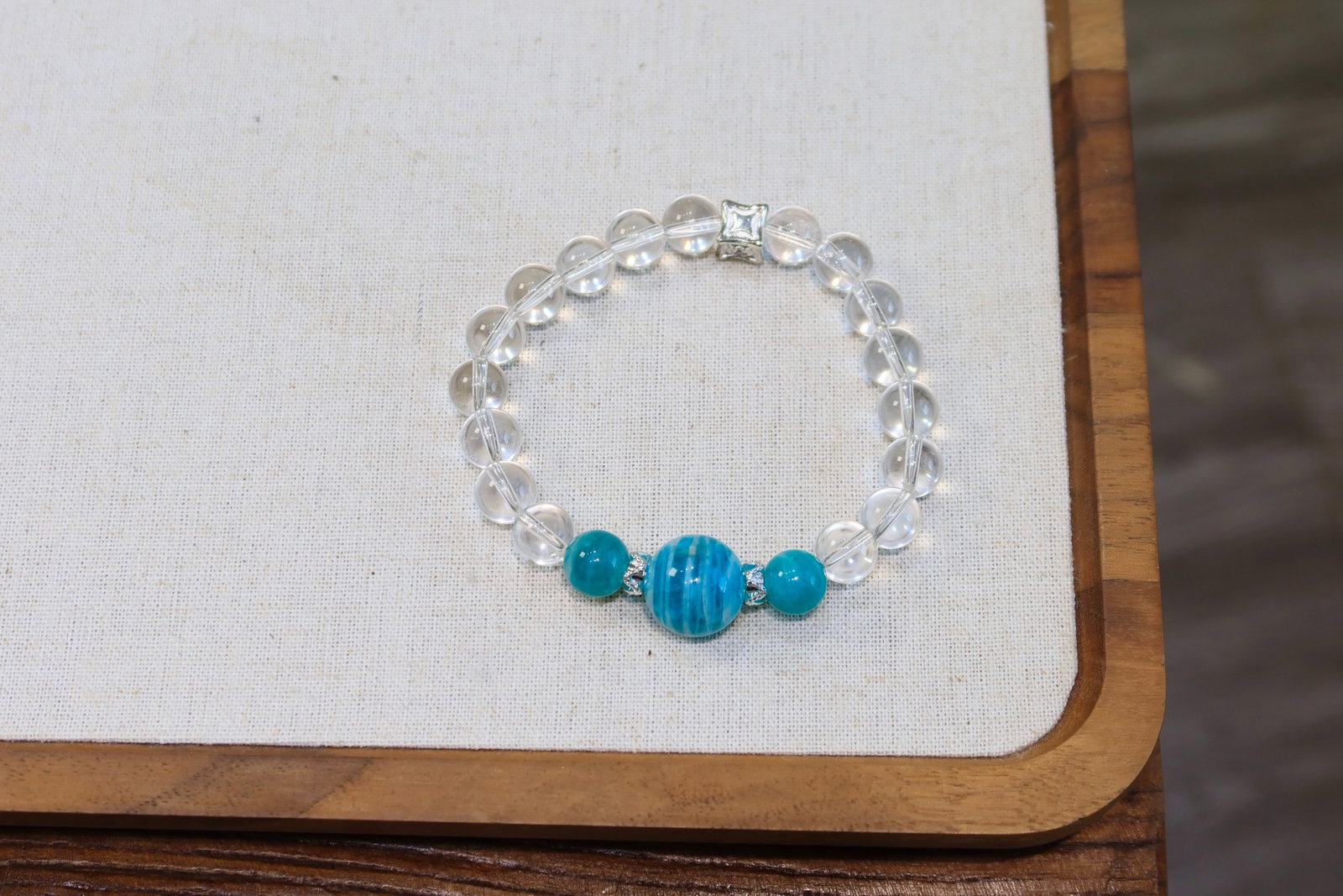 Natural White Crystal Bracelet: This bracelet features natural white crystal as the main stone, symbolizing health and inner balance. The large Amazonite stones add unique charm, combined with alloy fittings, showcasing a simple yet