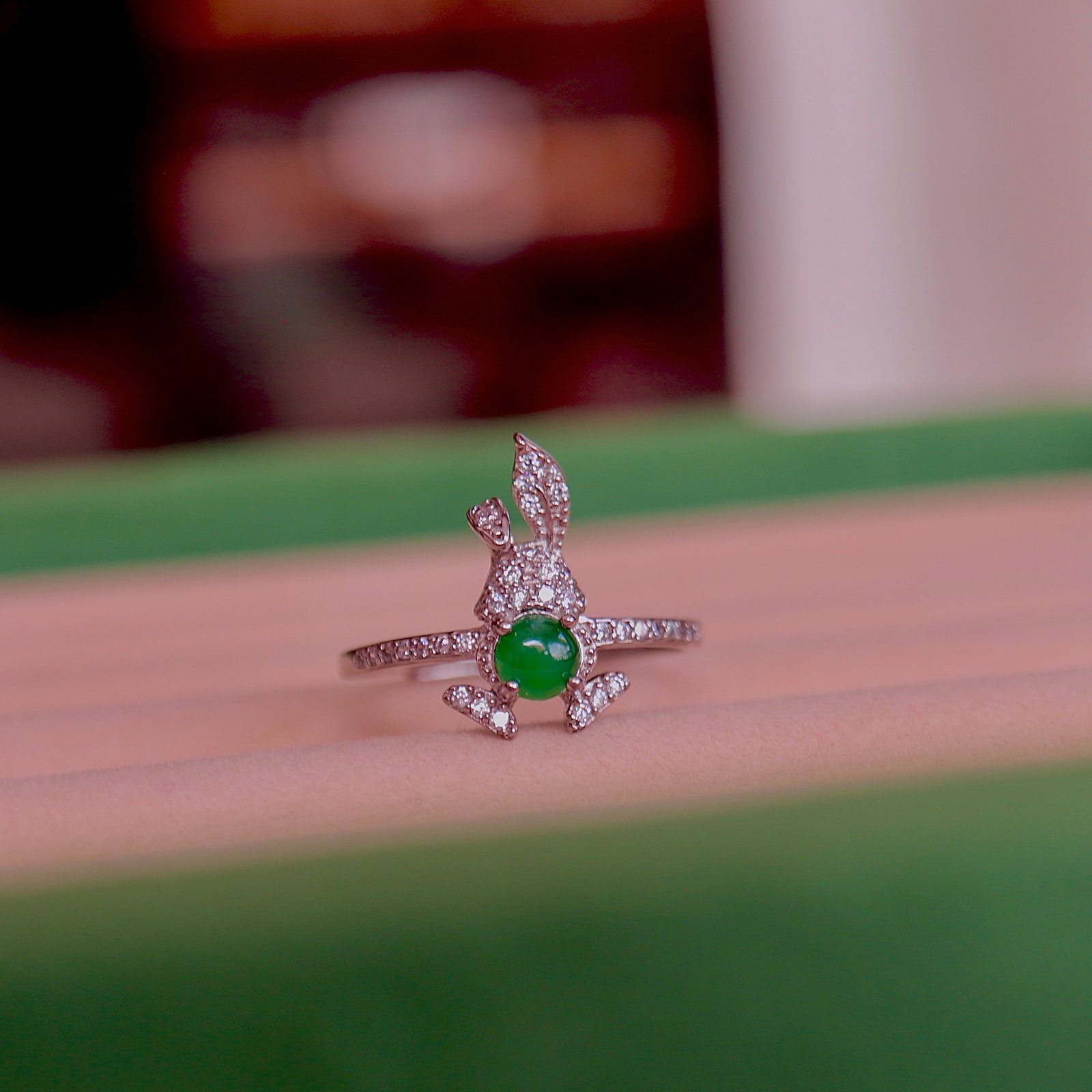 S925 Silver Natural Jadeite Ring: This ring is meticulously set in S925 silver, showcasing the beauty of natural jadeite in icy green. Inspired by the long-eared rabbit, it exudes a lively and playful charm. Perfect for those who