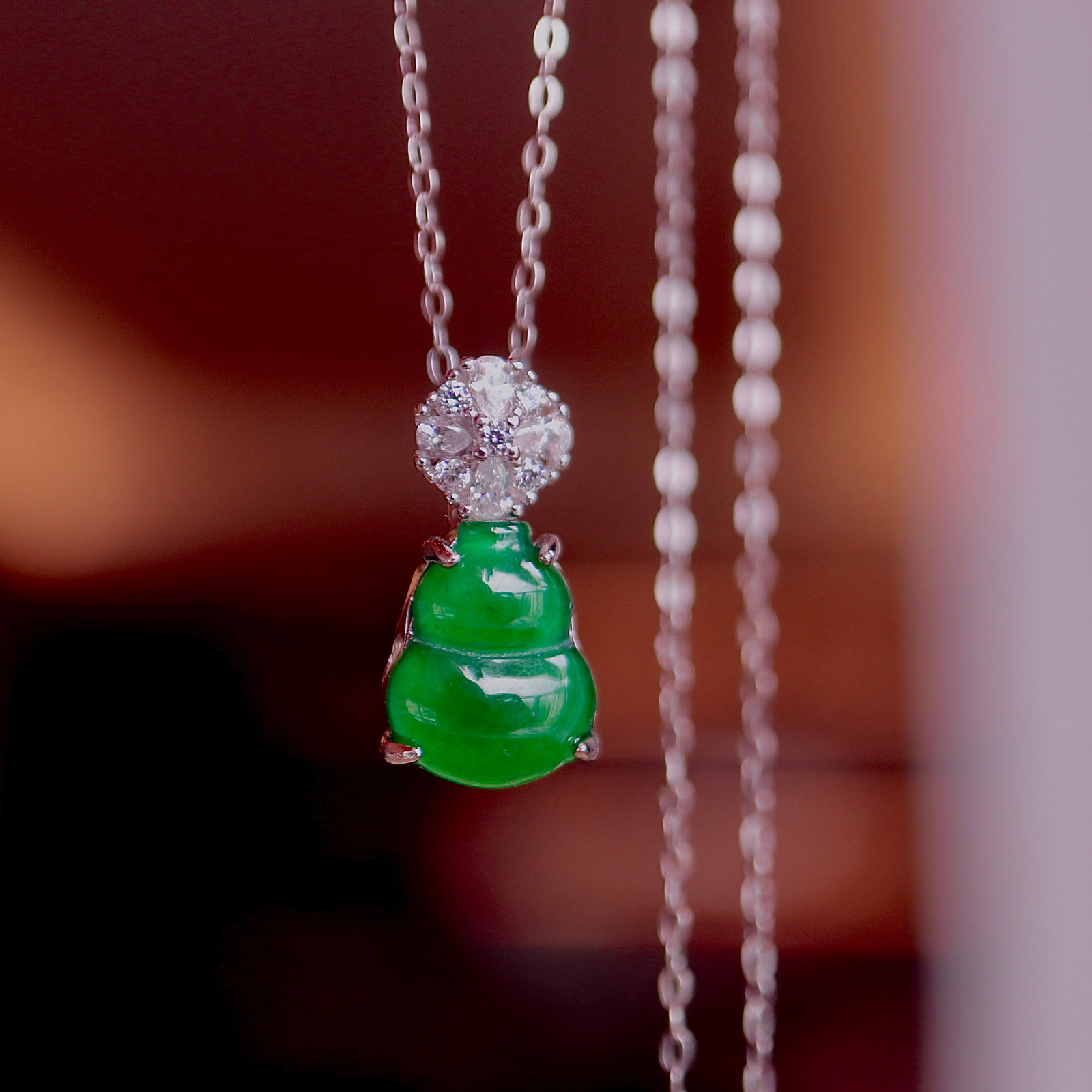 S925 Silver Natural Type Gourd Pendant: This natural Type gourd pendant is set in S925 silver, showcasing a captivating icy green hue. Its simple and elegant design symbolizes prosperity and happiness, suitable for any occasion. The
