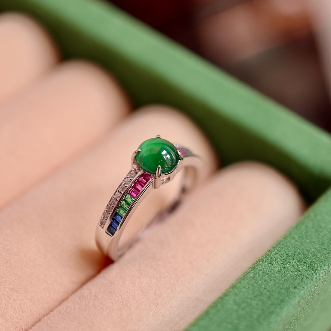 Sterling Silver Natural Jadeite Ring: This ring features a natural jadeite as the main stone, showcasing a simple and elegant design. Set in S925 silver with an adjustable open design suitable for various finger sizes. The icy green hue