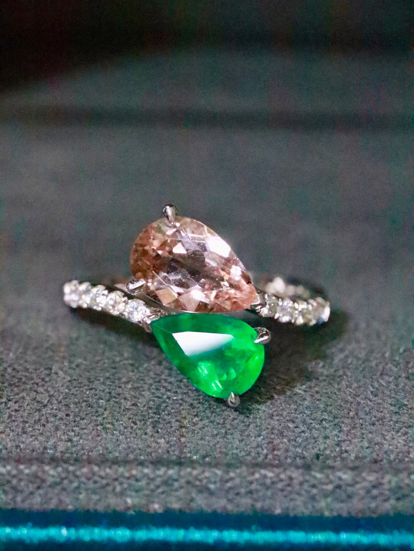 18K Gold Emerald Morganite Ring: This ring is crafted in 18K gold, showcasing the captivating contrast between emerald and morganite. The open design adds a modern touch, perfect for daily wear. Its exquisite craftsmanship and unique