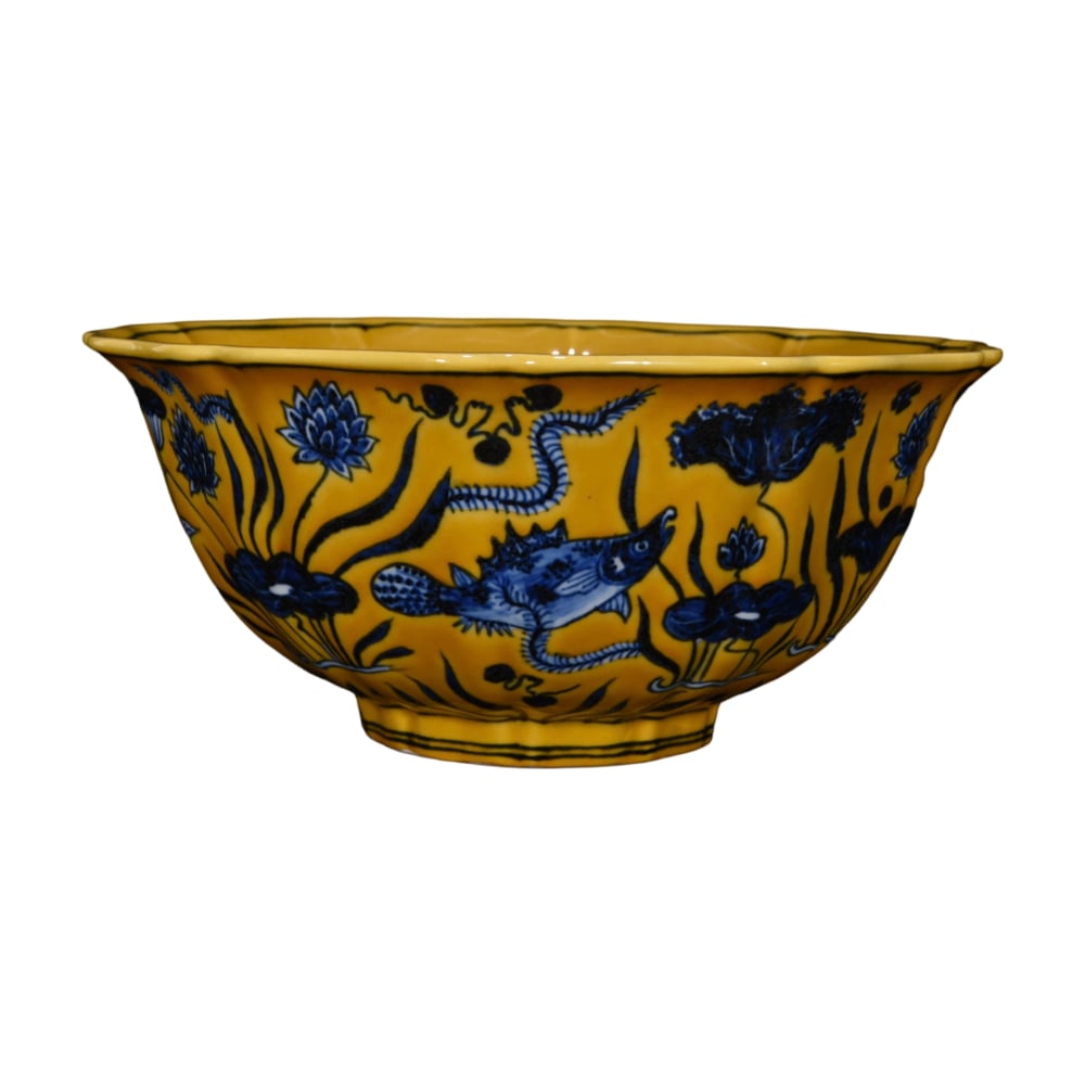 Ming Xuande Yellow Ground Blue and White Fish and Algae Pattern Ten-Lobed Bowl: The yellow ground blue and white fish and algae pattern ten-lobed bowl from the Ming Xuande period is renowned for its unique color combination and exquisite craftsmanship. The blue and white fish