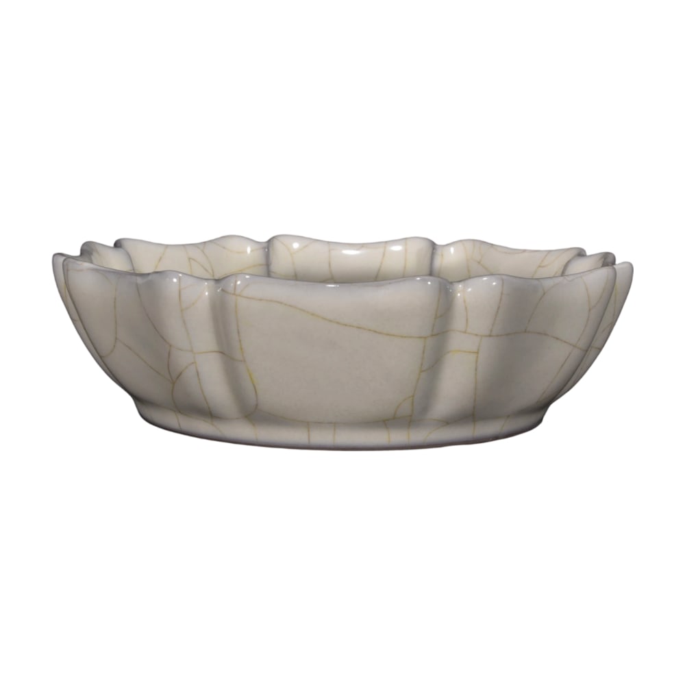 Song Dynasty Guan Kiln Moon White Glaze Eight-Sided Washer with Official Mark: This Song Dynasty Guan kiln moon white glaze eight-sided washer presents a gentle moon white hue throughout, with a naturally crackled glaze reminiscent of ice, exuding an ancient and elegant charm.