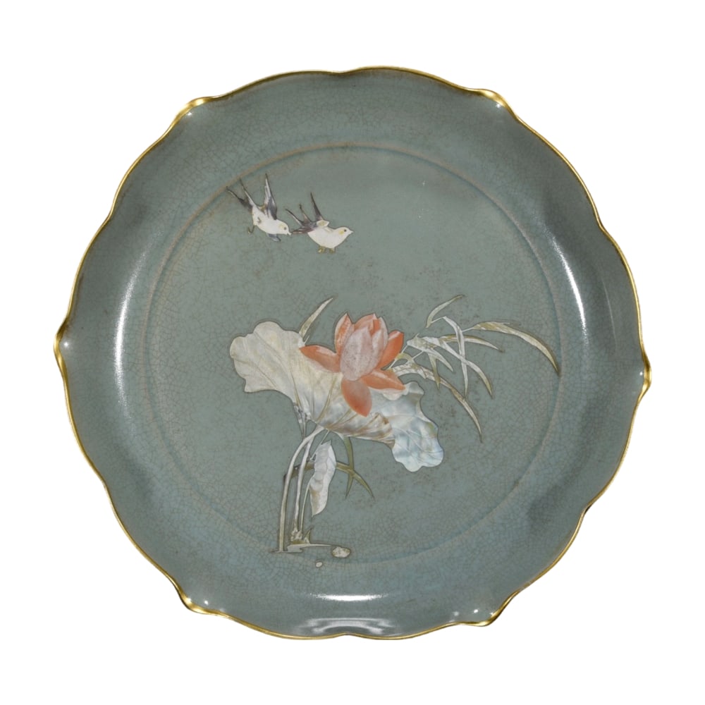 Song Dynasty Ru Kiln Gilded and Painted Floral and Butterfly Plate: This Song Dynasty Ru Kiln gilded and painted floral and butterfly plate showcases the elegance and refinement of Song ceramics with its delicate glaze and exquisite gilding. The floral and butterfly
