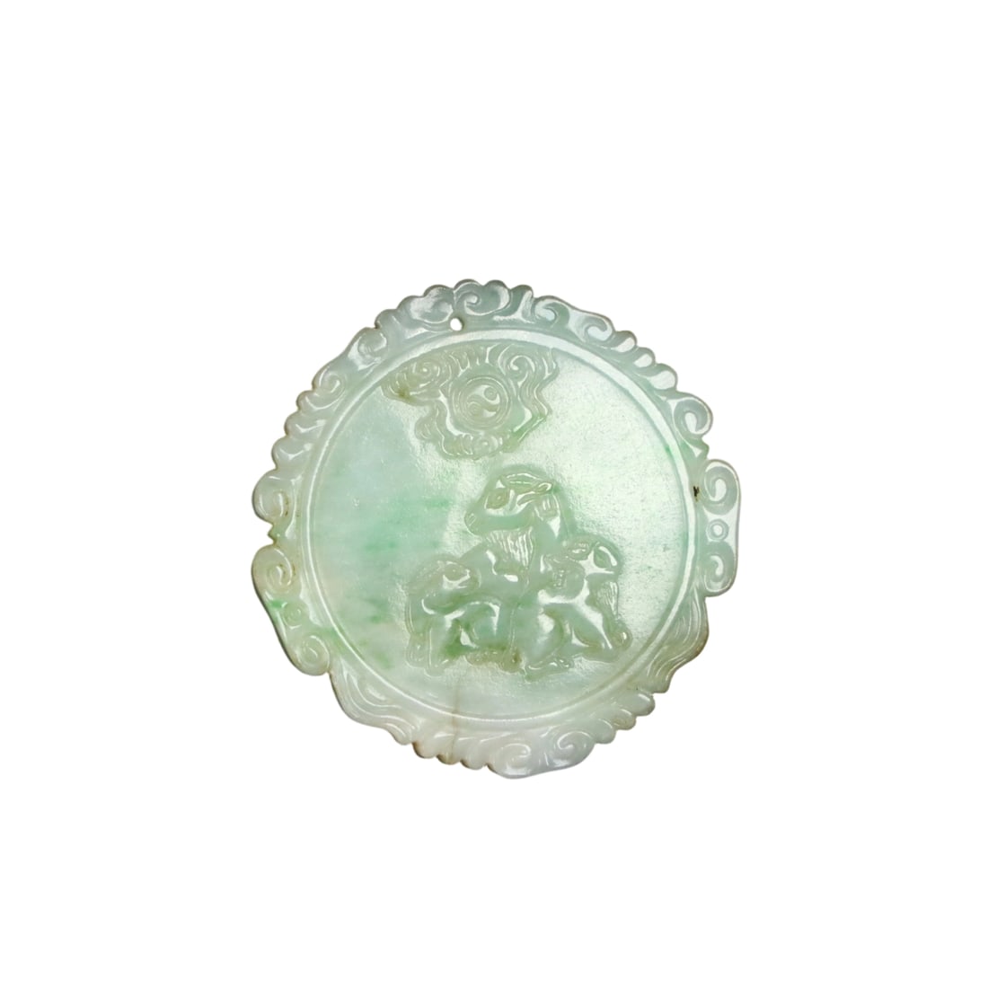 Jadeite Three Rams Pendant: This jadeite pendant features a fine and smooth texture with an aged patina, depicting the auspicious motif of 'Three Rams'. The craftsmanship is meticulous with rich details, making it highly