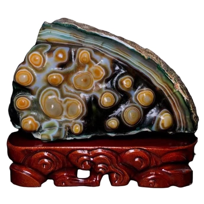 Eighteen-Eyed Dzi Bead Offering Stone: Tianyan stone is a natural wonder formed during the Earth's lithogenesis and sedimentary processes, characterized by eye-like patterns or structures. Especially those that have developed and