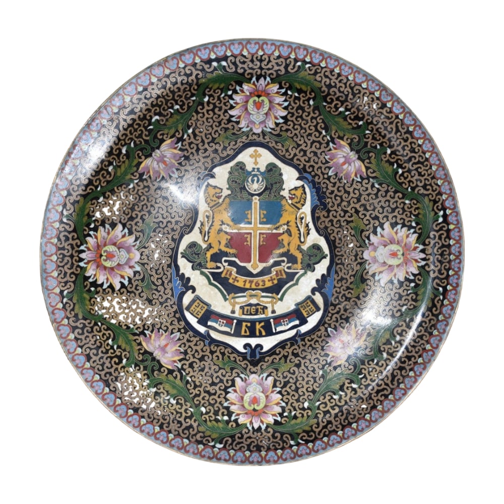 Large Cloisonn Plate with Copper Body: This large plate features a copper body with exquisite hand-crafted cloisonn work. The vibrant colors and intricate patterns showcase high craftsmanship, making it a valuable collectible. (Width