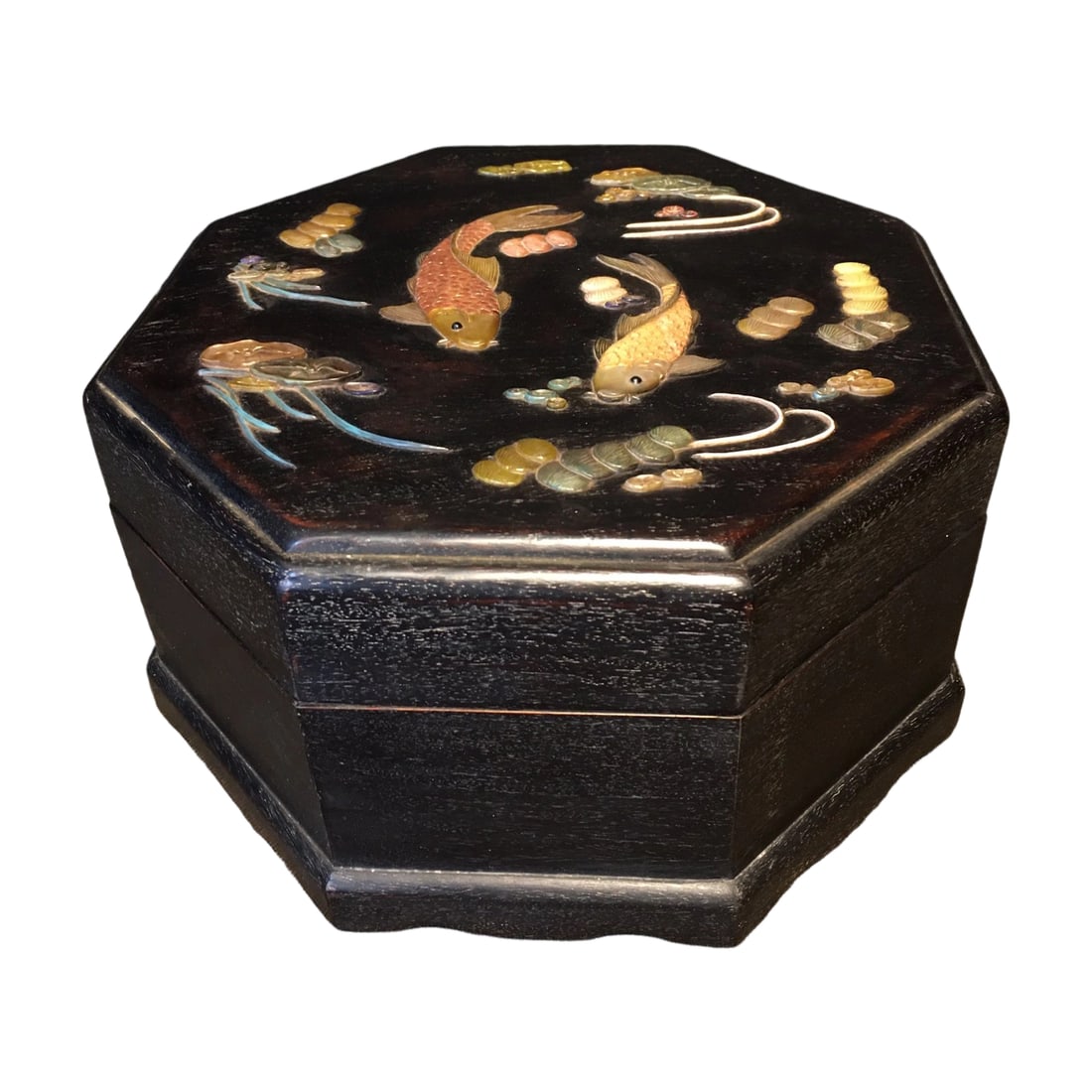 Zitan Wood Inlaid Treasure Box: This Zitan wood treasure box features exquisite inlay craftsmanship, showcasing superb artisanal skills. The box is smooth with intricate patterns and a deep hue, highlighting the noble quality of