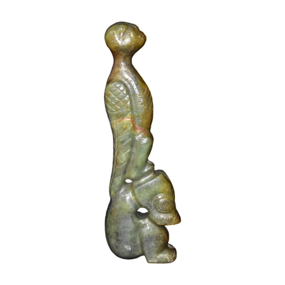 River-polished Jade Dragon: This river-polished jade dragon captivates collectors with its unique shape and natural jade quality. The smooth surface of the jade exhibits a natural luster, reflecting a high level of craftsmanship