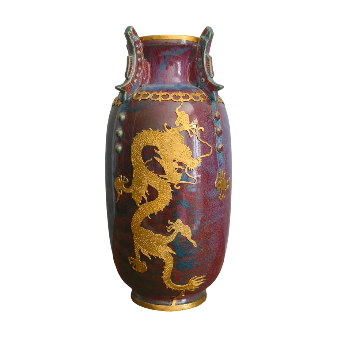 Guan Kiln Jun Glaze Fangding Vase: This Guan kiln fangding vase is adorned with Jun glaze, exhibiting a unique kiln transformation effect with its lustrous glaze. The vase features dragon inscriptions and exquisite gold patterns, showc