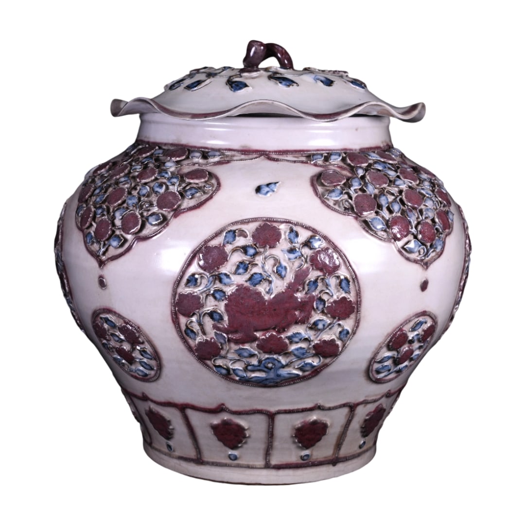 Yuan Dynasty Blue and White Underglaze Lion Pattern Lotus Leaf Jar: This Yuan Dynasty blue and white jar with underglaze red features an exquisite combination of scrolling floral and lion patterns through openwork carving techniques. The craftsmanship is intricate, sh