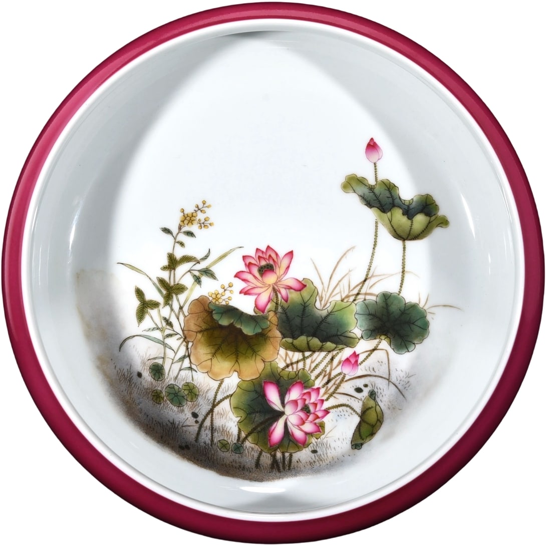 Yongzheng Period Famille Rose Rouge-de-fer Lotus Water Basin: This Yongzheng period famille rose rouge-de-fer lotus water basin features vibrant colors and exquisite craftsmanship, reflecting the elegance and delicacy of famille rose porcelain from the Yongzheng