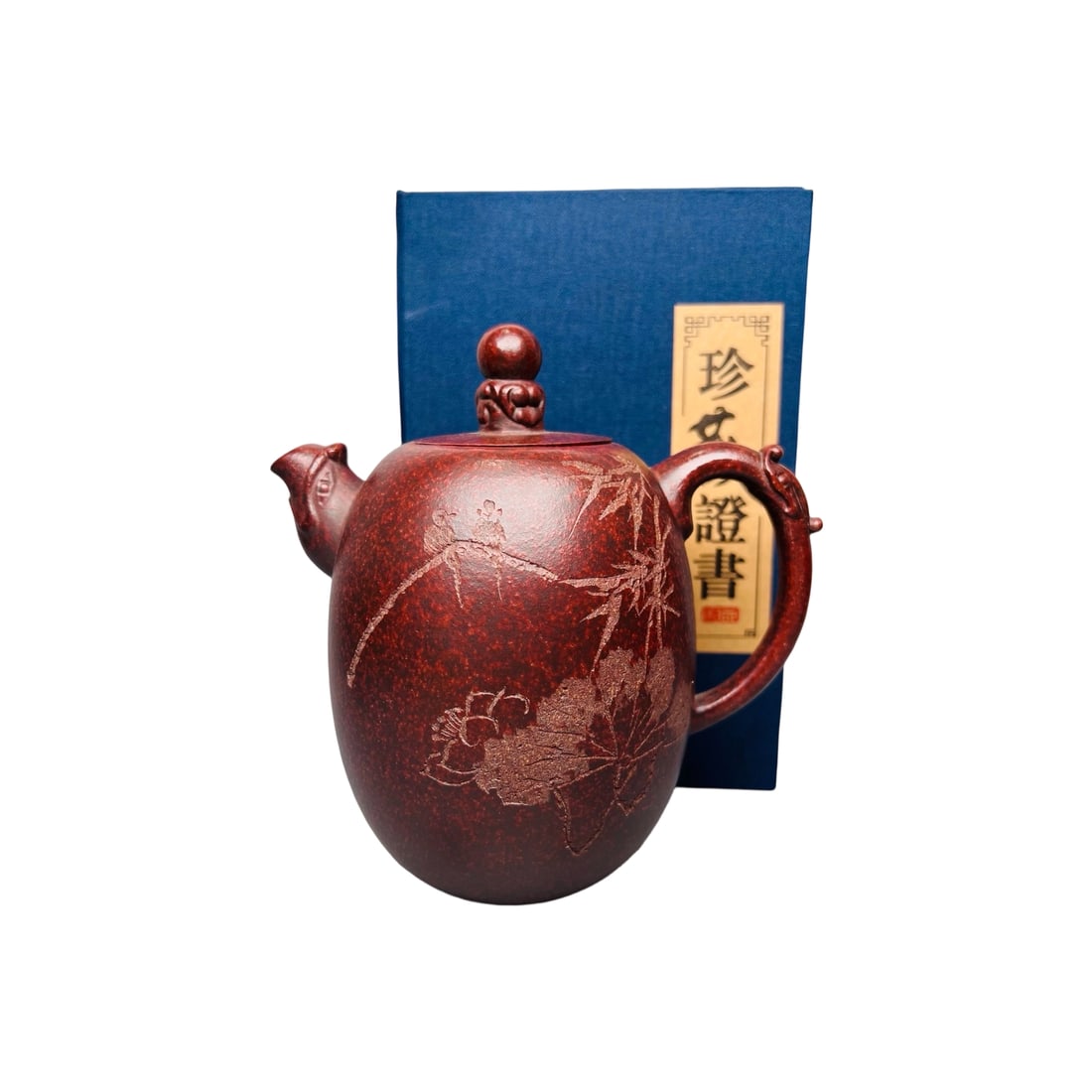 Zisha Dragon Blood Sand Longzhu Teapot: This Zisha teapot is crafted by the renowned master Jingzhou, using the precious original Dragon Blood Sand. The texture is delicate and the color is rich. The teapot is in the Longzhu shape, with smo