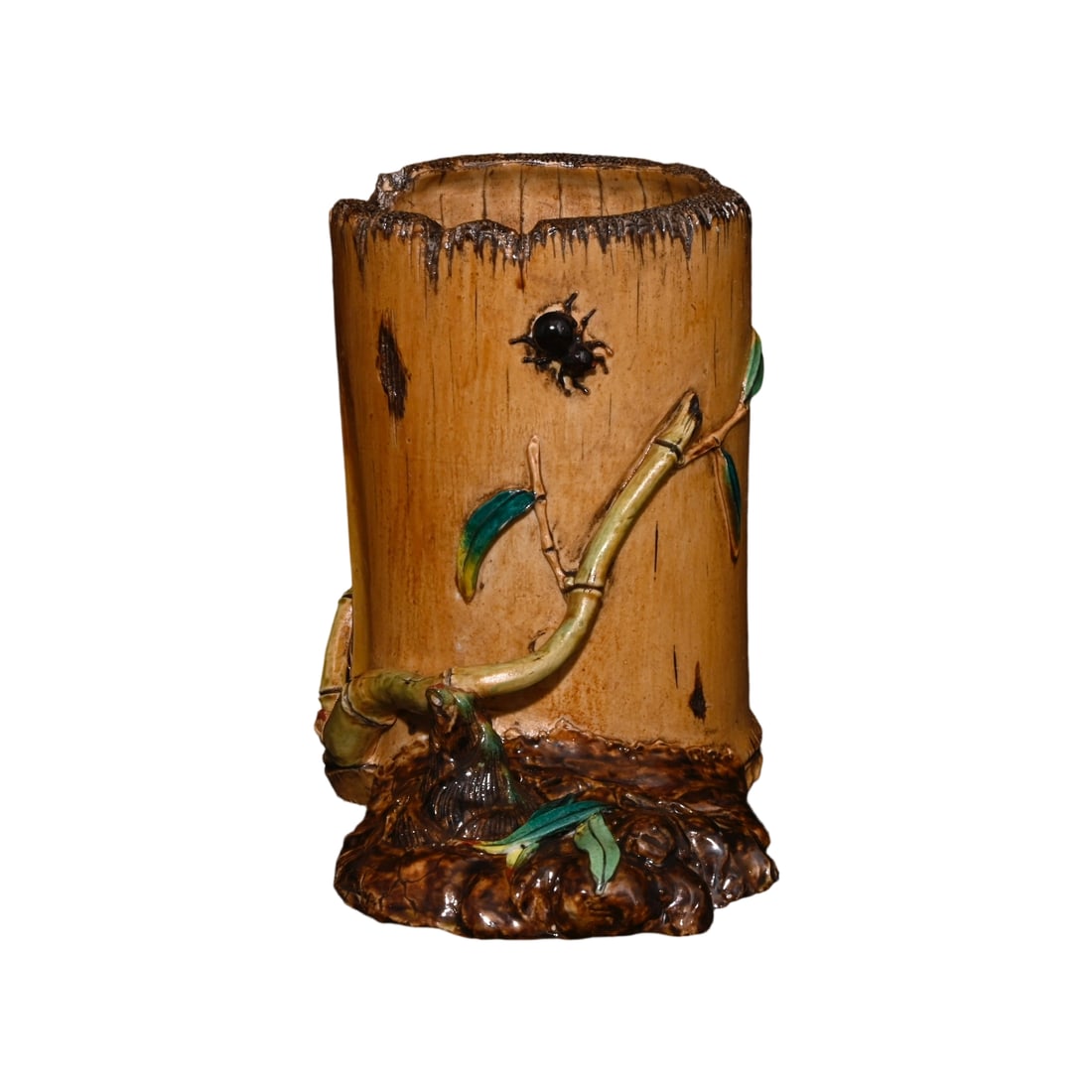 Qianlong Period Imitation Porcelain Bamboo Pen Holder: This pen holder is an imitation porcelain piece from the Qianlong period, with a unique design symbolizing continuous growth. The porcelain is delicate, and the glaze is lustrous, reflecting the high 