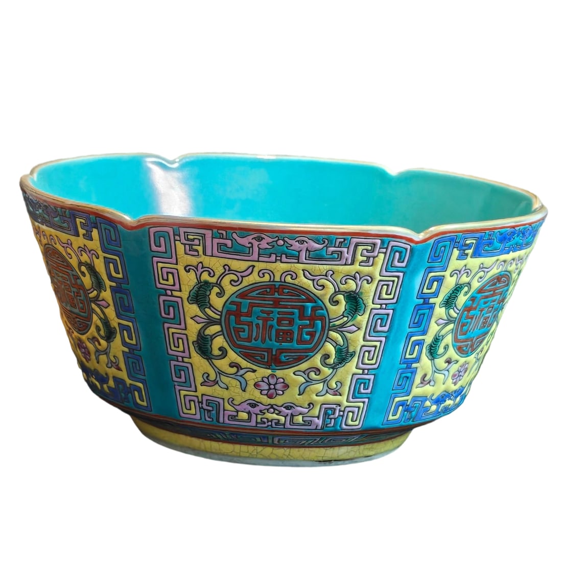 Qing Dynasty Yongzheng Famille Rose Bowl with Gold Rim and Fu Shou Design: This Qing Dynasty Yongzheng period famille rose bowl is renowned for its exquisite Fu Shou design and gold rim decoration. The famille rose technique reached its peak during the Yongzheng era, charact