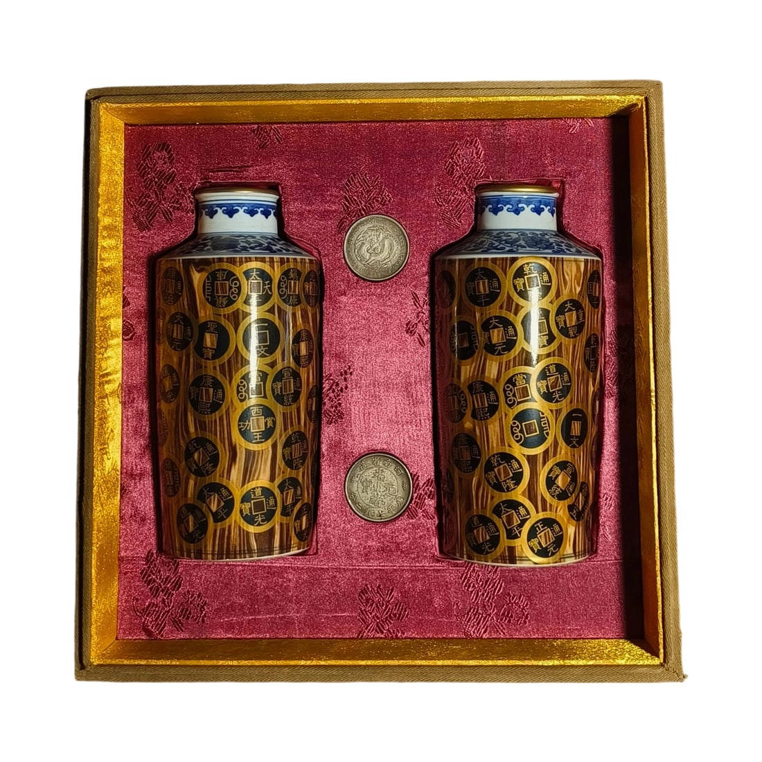 Pair of Qianlong Wood Grain Glaze Vases with Coin Pattern: This pair of vases is crafted with Qianlong period wood grain glaze, featuring exquisite coin patterns that demonstrate the superb craftsmanship of the Qing dynasty. They are well-preserved and in exc