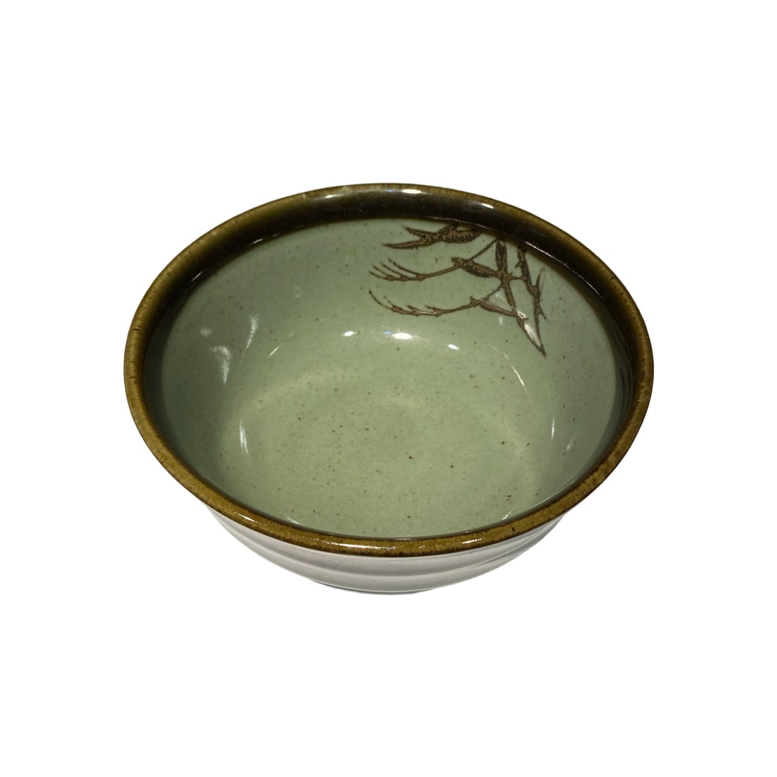 Celadon Bamboo Leaf Pattern Porcelain Bowl: This celadon bamboo leaf pattern porcelain bowl features a rich patina, reflecting the passage of time and an ancient beauty. The bowl's lines are smooth, and the bamboo leaf patterns are clear,