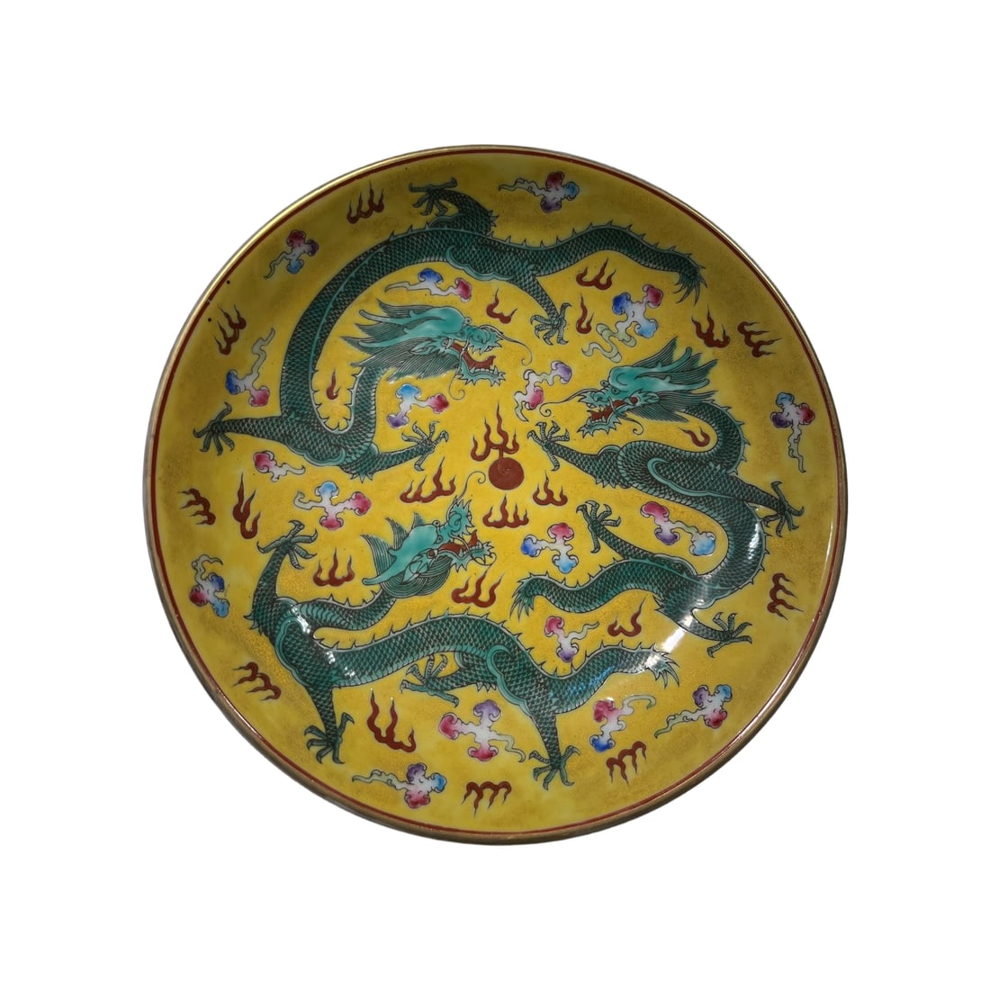 Famille Rose Yellow Ground Floral Dragon Plate: This Famille Rose porcelain plate features a yellow ground with exquisite floral and dragon motifs. The glaze is thick and the body is surrounded by intricate floral designs, showcasing the