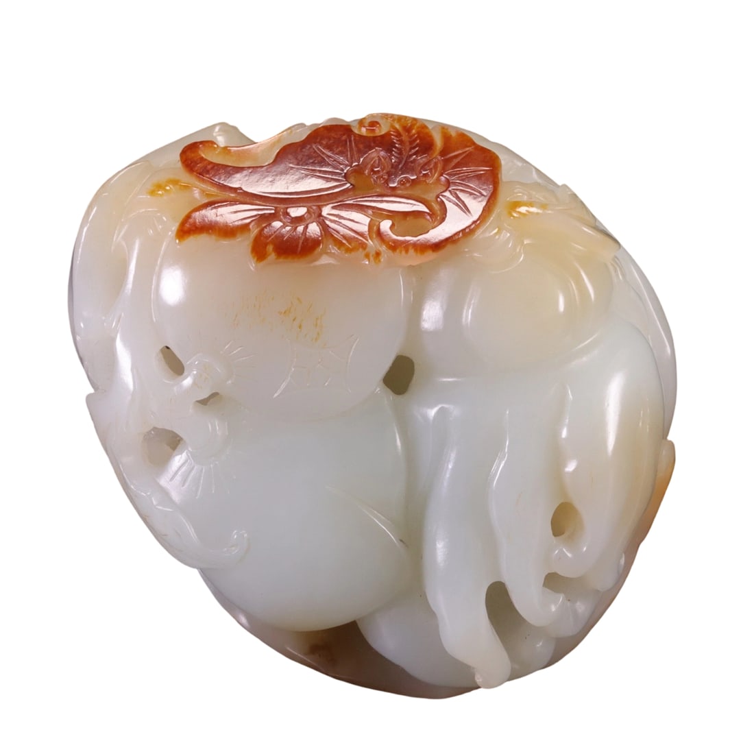 Hetian Jade Handle Piece: This Hetian jade handle piece features a warm and delicate texture with a gentle luster, offering a comfortable feel. The carving is meticulous with smooth lines, showcasing a high level of