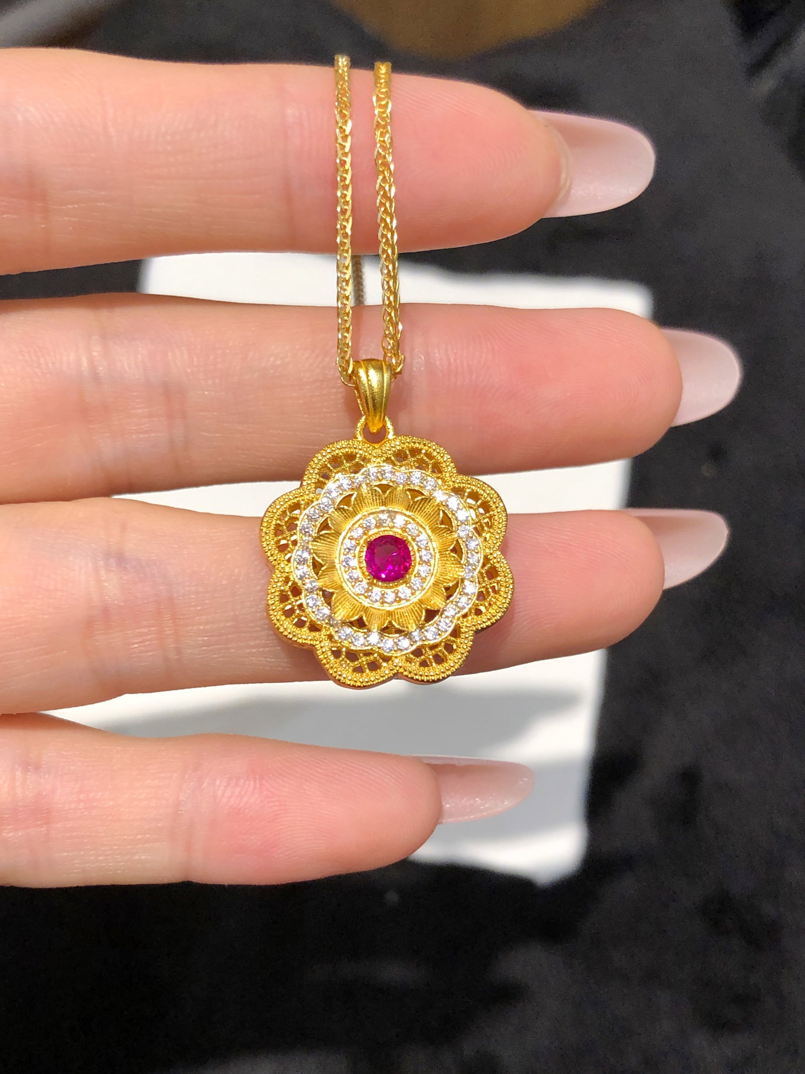 Pure Silver Vintage Filigree Necklace: This pure silver necklace is crafted with vintage filigree technique, featuring a cleverly designed center pink stone that can rotate freely, adding a touch of dynamism. The intricate hollow patterns 