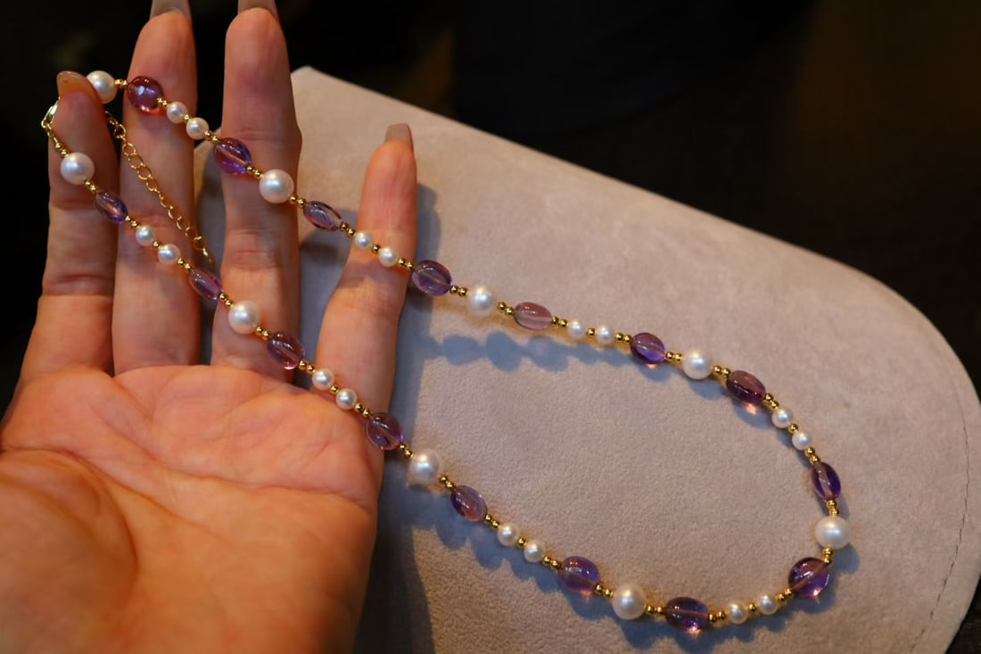 Natural Pearl and Amethyst Necklace: This necklace elegantly combines gentle pearls with amethyst, resembling candy-like colors that add a playful touch. The sterling silver ensures lasting shine and quality, with an overall design that 
