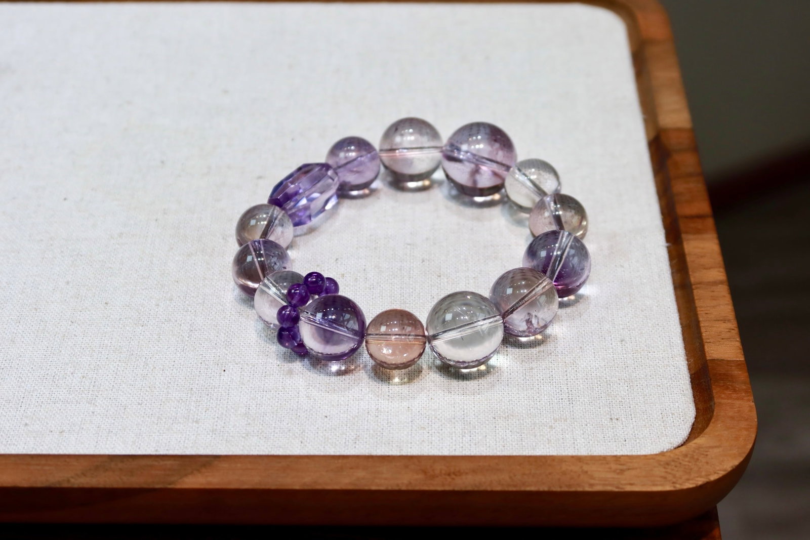 Natural Ametrine Bracelet: This natural ametrine bracelet showcases a noble aura with its crystal-clear texture. The beautiful combination of two colors gives the wearer a unique elegance and charm. Paired with amethyst running