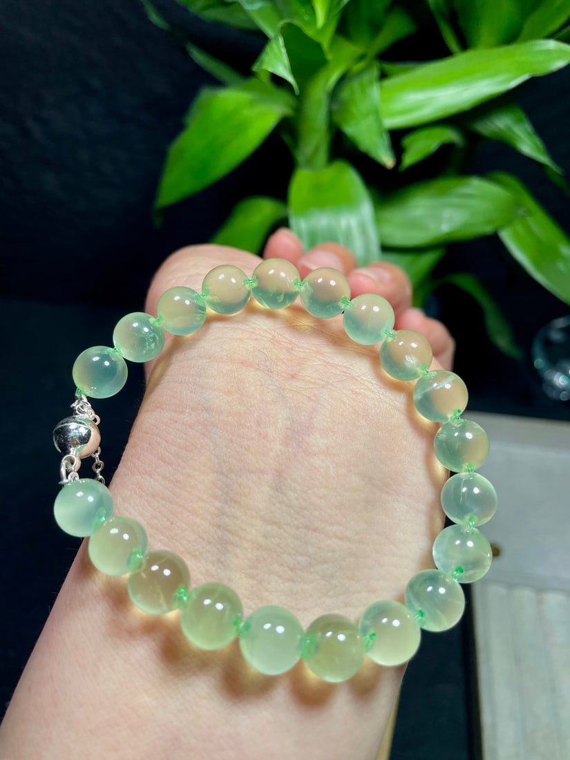 Prehnite Bracelet: This bracelet features elegant prehnite, showcasing its natural color and luster. Each bead is carefully selected to ensure overall harmony. The weight and texture of the bracelet are impressive when 