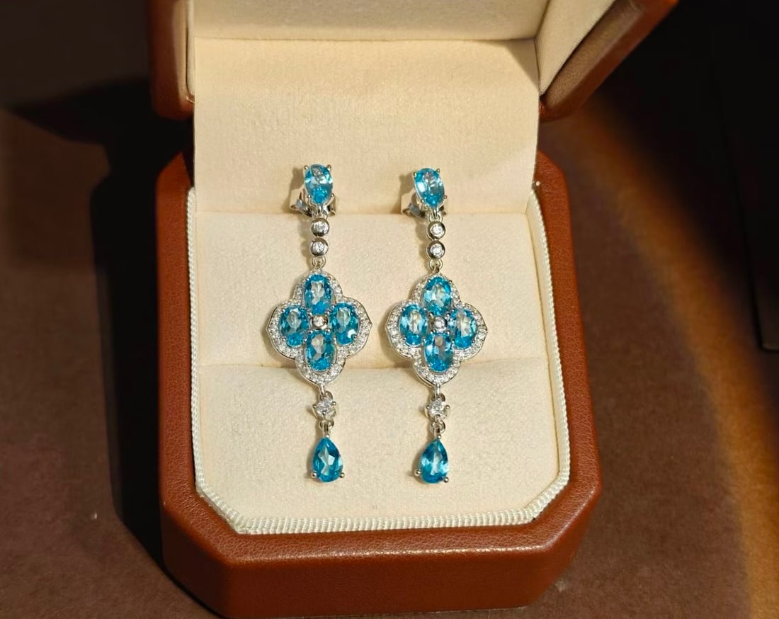 925 Silver Natural Topaz Earrings: These earrings are crafted from 925 silver and set with natural topaz, showcasing a simple yet elegant style. The fresh hue of the topaz adds a bright touch to the summer. Freight: 1.International Fre