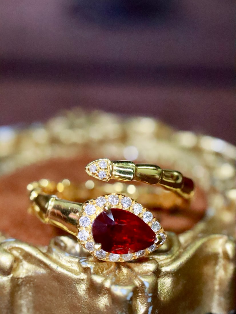 18K Gold Natural No-Heat Ruby Snake Ring: This ring is inspired by the captivating form of a snake, exuding unparalleled luxury. The no-heat ruby shines brilliantly, perfectly complementing the exquisite design, empowering the wearer with a