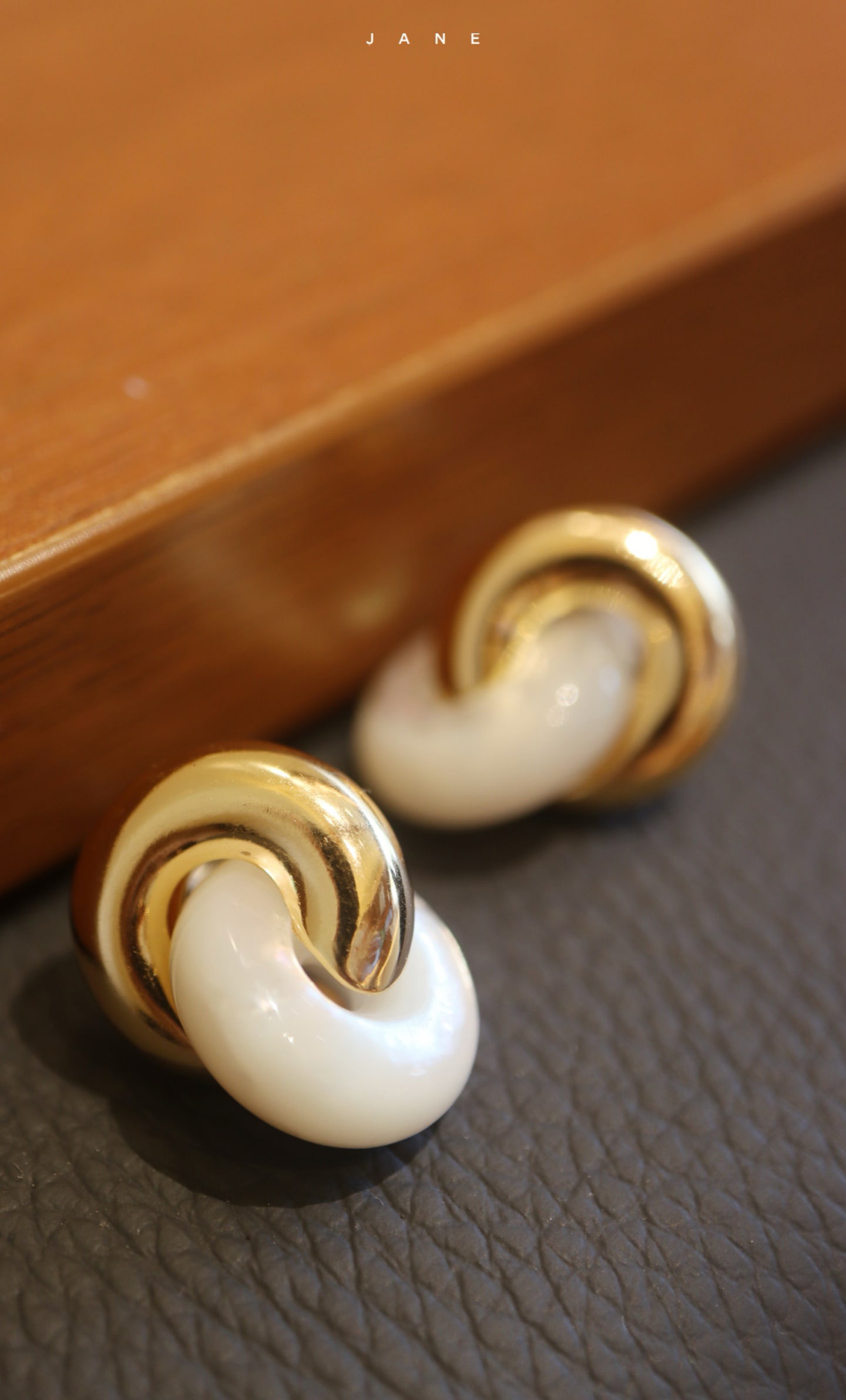 Sterling Silver White Mother-of-Pearl Earrings: These earrings feature white mother-of-pearl, showcasing a pure natural beauty. The delicate design adds a light touch to the ears, suitable for various occasions. Made of sterling silver for comforta