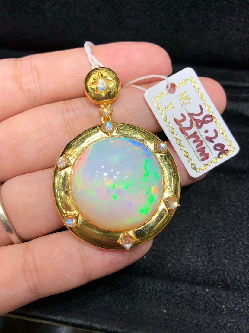 Natural Colorful Opal Pendant: This natural colorful opal pendant captivates every wearer with its unique colors and luster. The dazzling brilliance of the main stone complements the finely crafted S925 sterling silver setting,