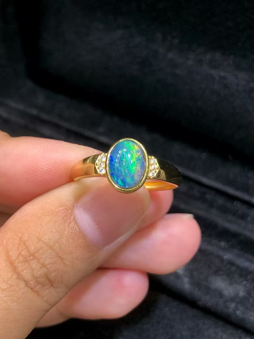 Natural Opal Ring: This natural opal ring captivates every wearer with its unique colors and luster. The exquisite cut of the main stone combined with the S925 sterling silver showcases an unparalleled elegance. (Main