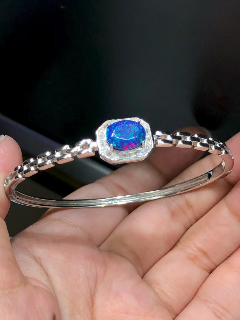 Natural Colorful Purple Opal Bracelet: This bracelet features a natural colorful purple opal as the main stone, showcasing unique color variations and luster, complemented by exquisite S925 sterling silver setting, embodying elegance and l