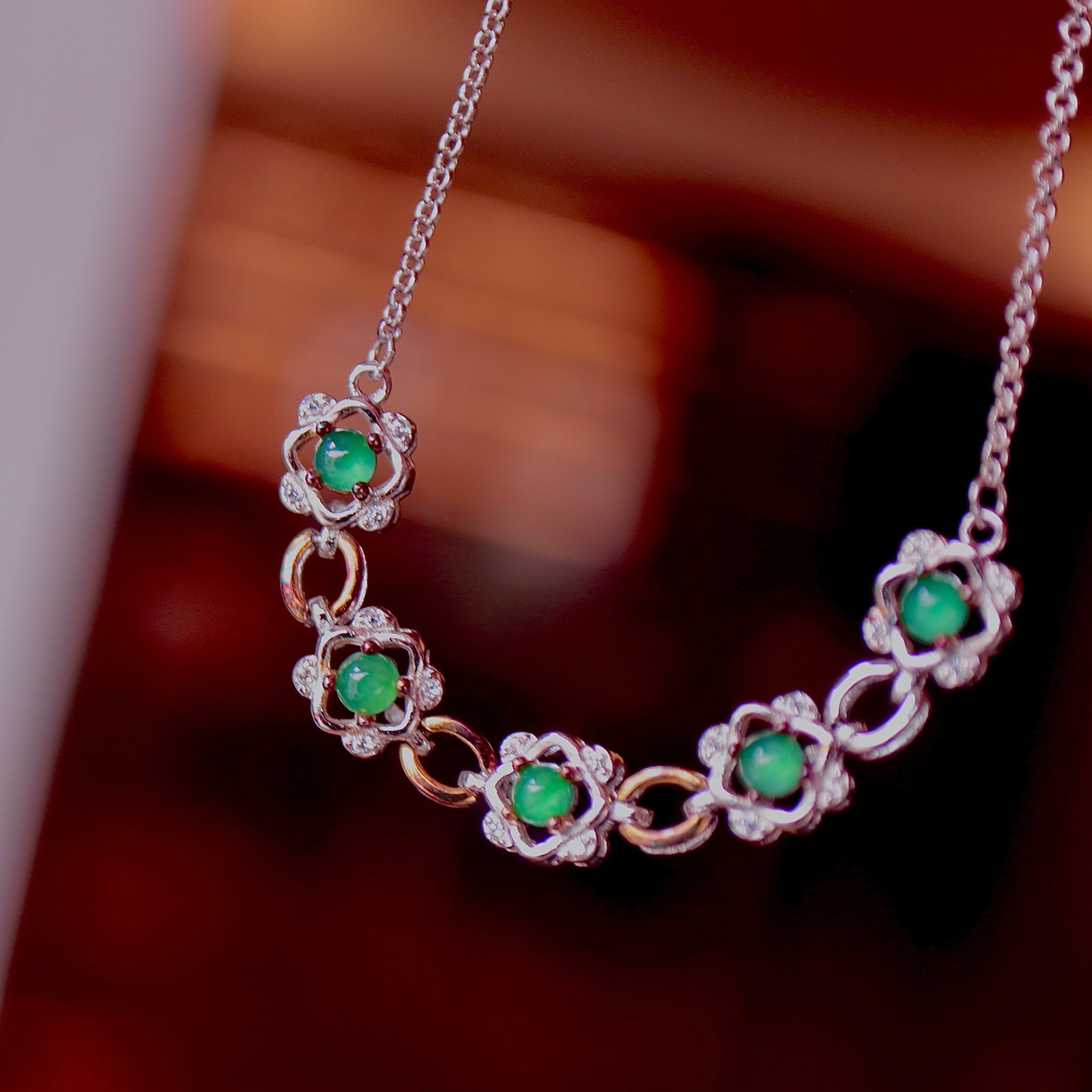 S925 Silver Natural Jade Bracelet: This bracelet is meticulously set in S925 silver, showcasing the natural allure of 5 vivid green jade stones. The bright green hue and icy transparency of the jade complement each other, making it an 