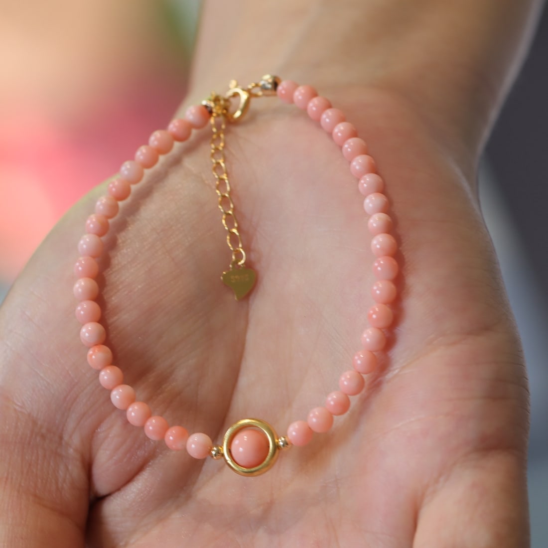 Natural Red Coral Bracelet: This natural red coral bracelet features a baby-skin-like texture and a simple, stylish design, showcasing unparalleled elegance. Paired with an S925 silver tail chain, it adds a touch of sophisticati