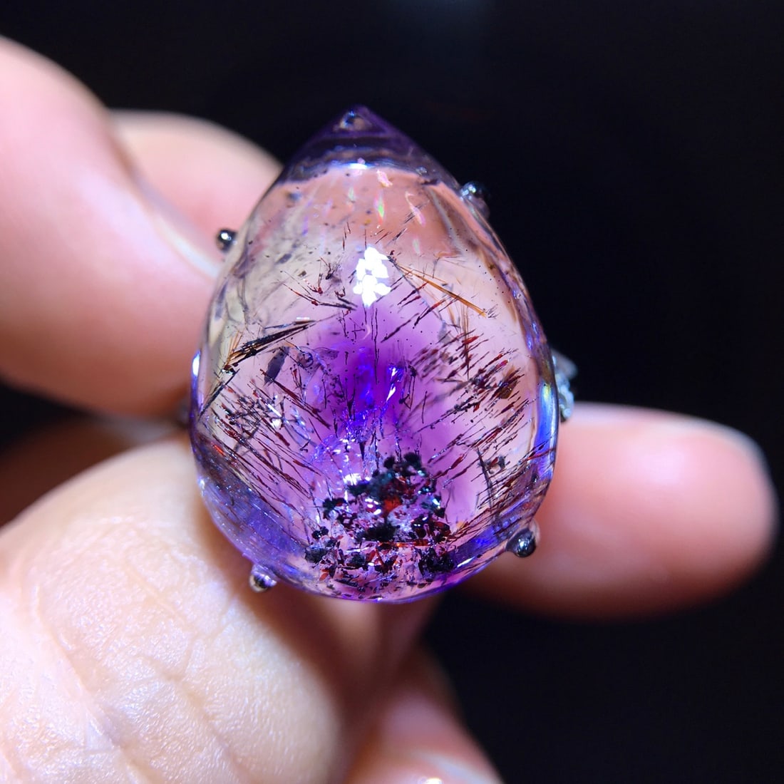 Natural Purple Rutilated Quartz Ring: This ring features a natural purple rutilated quartz as the main stone, showcasing a mysterious and dreamy purple hue. The crystal is lustrous, set in 925 sterling silver, suitable for various occasio