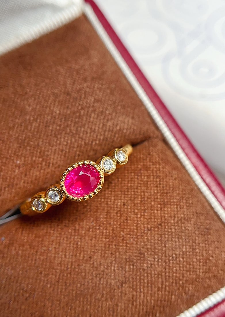 18K Gold Natural Unheated Pigeon's Blood Red Ruby Ring: This ring is meticulously crafted in 18K gold, featuring an unheated pigeon's blood red ruby, showcasing a classic vintage style. Four lab-grown diamonds surround the main stone, adding a brilliant sp