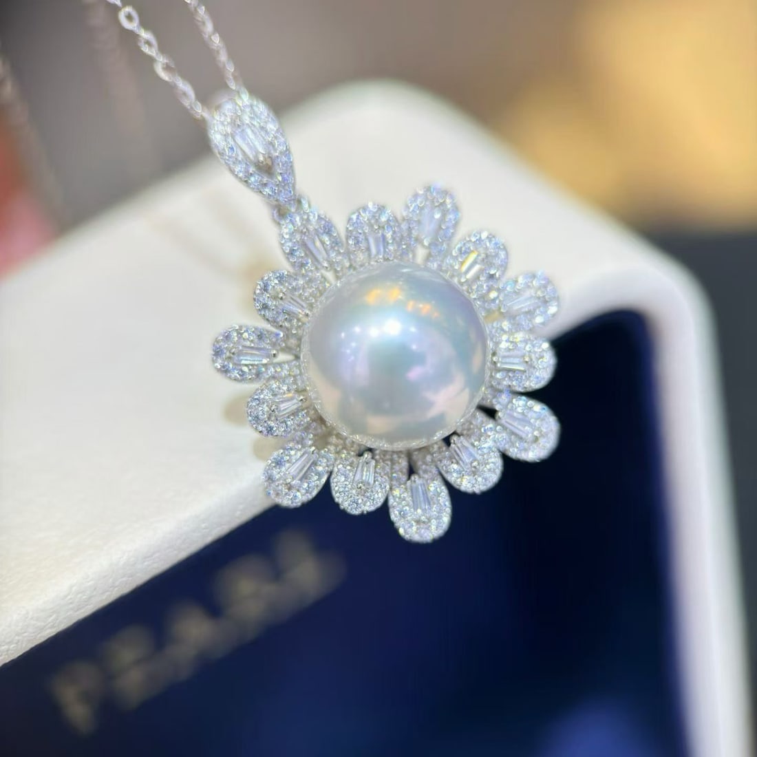Sterling Silver Perfect Round Edison Pearl Pendant: This pendant showcases the natural beauty of pearls with its perfect round shape and nearly flawless mirror luster. Luxuriously set in sterling silver, it adds a touch of elegance. Paired with a 3-4mm